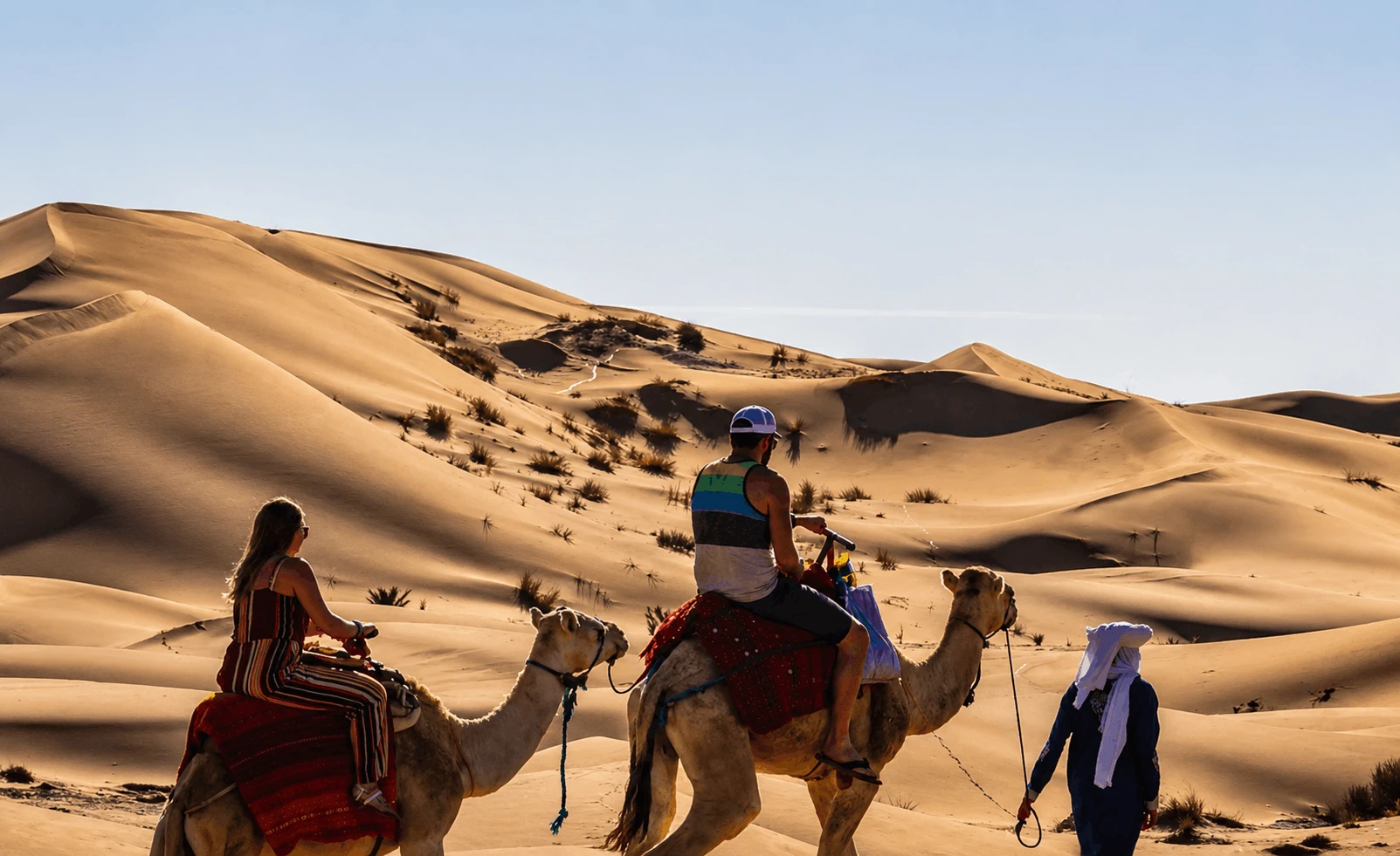 Camel trek across Moroccan desert dunes
